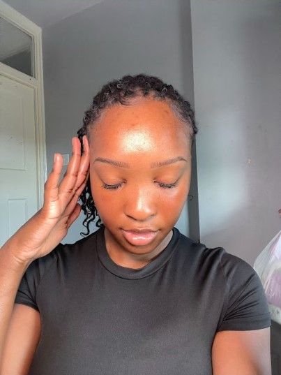 Hands with serum bottle